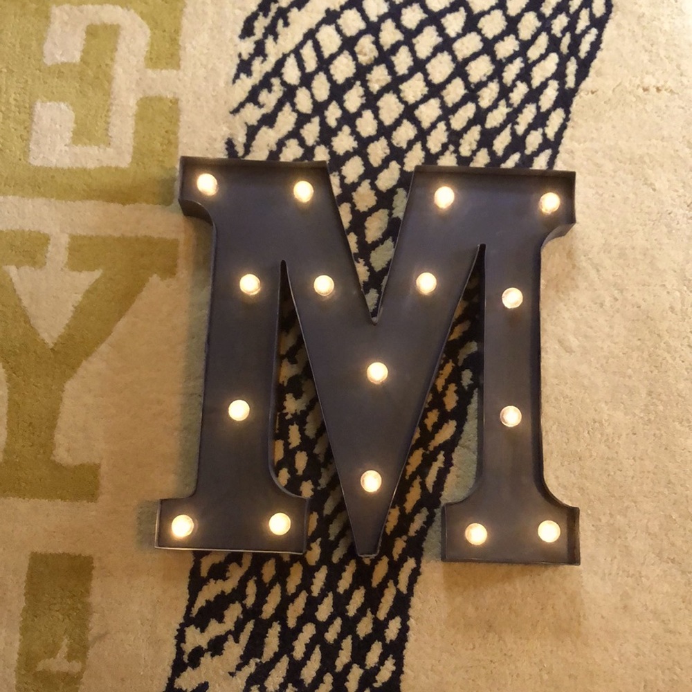 Metal M sign
